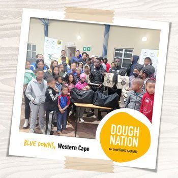 Little ones sport huge smiles after Doughnation from Debonairs Pizza Blue Downs
