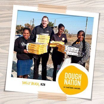 Khula CrÃƒ¨che enjoys Doughnation courtesy of Debonairs Pizza Shelly Beach