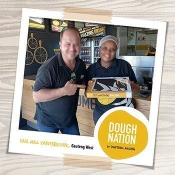 Debonairs Pizza team brightens school assistants' day