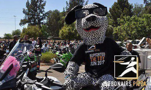 Person in a dog costume. Debonairs toy run