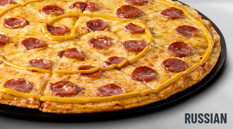 Russian Pizza on a black slate