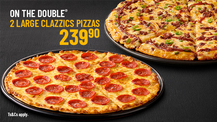 Two large pizzas: a classic pepperoni, and a meat, jalapeño, and BBQ sauce pizza, promoting the '2 Large Clazzics Pizzas' deal.